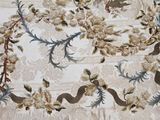 an image of a table cloth with flowers and birds
