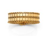 un bracelet en or composé d'un maillon et d'un fermoir
