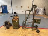 two machines that are sitting in a warehouse
