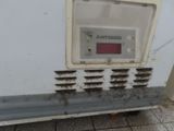 an image of a dirty refrigerator with the door open