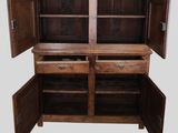 an image of a wooden cabinet with two doors open
