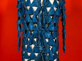 an image of a mannequin dress made out of blue leather