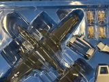 a toy airplane that is in a box on the table