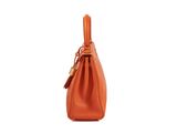 a small orange purse with a handle and a strap