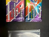 deux tubes de dentifrice et une brosse à dents posés sur une table