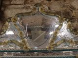 a picture of a mirror with a shield on it