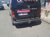 a van that is parked on the side of the street