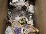 a cardboard box filled with many different types of items