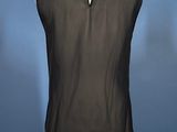 the back of a black top on a mannequin mannequin mannequin mannequin mannequin mannequin mannequin mannequin