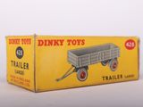 an old toy truck with a box on the back of it