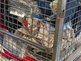 a cage with a lot of items inside of it
