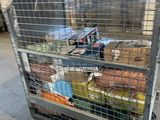 a cart full of food that is sitting on the floor