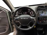 the interior of a car with a steering wheel and dashboard controls