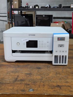 a printer that is sitting on a table in a room
