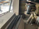 a picture of a room with a lot of wood in it