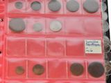 a picture of a red binder with coins in it