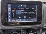 a car dashboard with a digital display on it