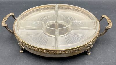 an image of a glass serving dish on a black surface