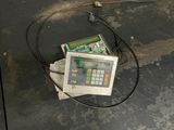 an electronic device that is sitting on the floor
