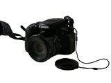 a camera with a strap attached to it ' s body