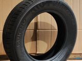 tires are stacked on a cardboard box in a warehouse