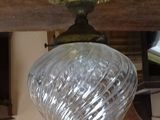 a light that is hanging from the ceiling in the room