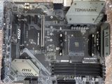 a close up of a motherboard with a cpu on it