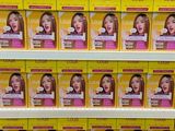many boxes of hair products on the shelves in the store