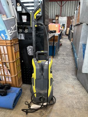 an image of a yellow and black vacuum cleaner