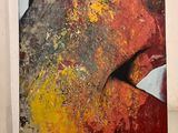 abstract painting of a woman ' s face on a red and yellow background