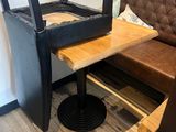a table with a mirror on top of it in a room