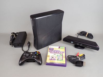 a video game system and a game controller on a table