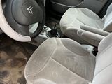 the interior of a car with a dirty floor and dirty seats