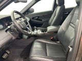 the interior of a car with leather seats and a steering wheel