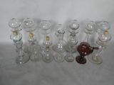 a lot of wine glasses that are sitting on a table