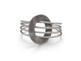 a close up of a ring with a metal ring on top of it