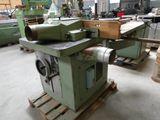 a machine that is sitting on a pallet in a warehouse