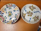 two plates that are sitting on a table