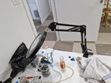 an image of a table with a camera and other items