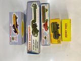 three boxes of toy cars on a white surface