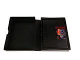 a black folder with a picture of a man on it