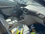 the interior of a car with a bunch of items inside of it