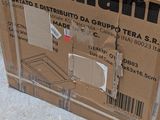 a cardboard box that is sitting on the ground