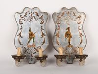 Paire d'appliques décoratives à deux lumières en fer et à l'…