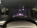 an image of a car dashboard with a digital display