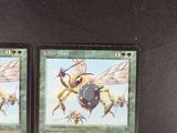two cards with a picture of a bee and a bee on them