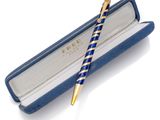 an image of a pen in a blue case with a gold tip