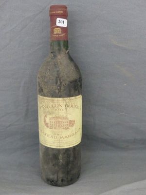 a bottle of wine that is sitting on a table