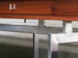 a wooden table with a drawer on top of it