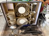 a display of silverware and silverware on a table